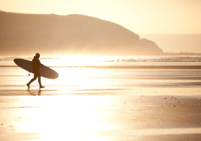 Sunset longboarder by Tony Cobley